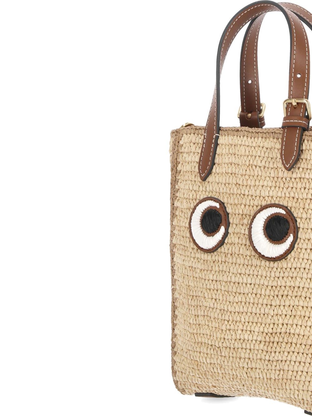 bag with eyes embroidered on the front