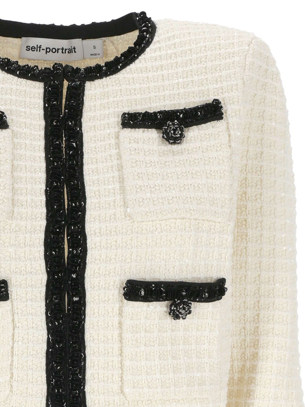 White knitted jacket