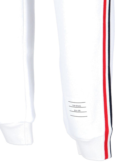 Sports trousers with tricolour details