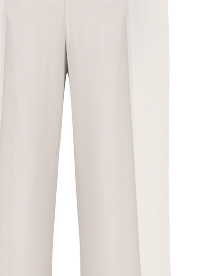 Pantaloni eleganti in crema