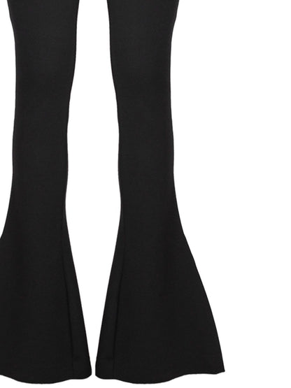 Pantaloni neri con dettagli ritagliati dal design elasticizzato