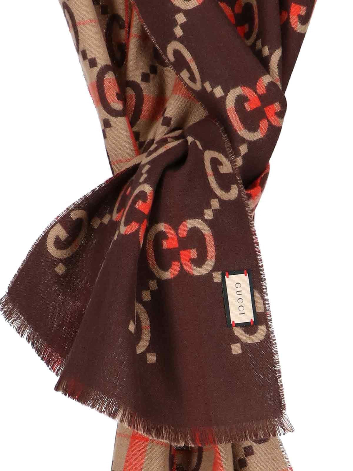 gucci sciarpa "gg" tartan-sciarpe & foulard-Gucci-sciarpa "gg" tartan gucci, in lana beige, dettagli marroni e rossi, pattern logo all-over, orlo a taglio vivo. codice prodotto 721563 4gae82179 made in: italia - 100% lana - Dresso