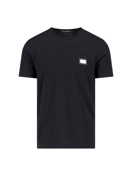 Dolce & Gabbana T-Shirt logo-t-shirt-Dolce & Gabbana-T-shirt logo Dolce & Gabbana, in cotone nero, girocollo, maniche corte, placca logo metallico argentato petto, orlo dritto.-Dresso