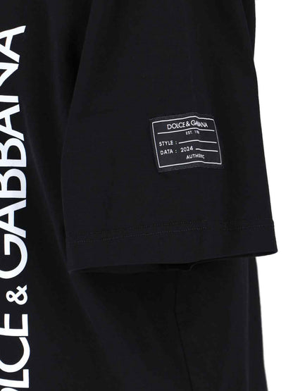 Dolce & Gabbana T-Shirt logo-t-shirt-Dolce & Gabbana-T-shirt logo Dolce & Gabbana, in cotone nero, girocollo, maniche corte, stampa logo bianco fronte, etichetta logo manica, orlo dritto.-Dresso