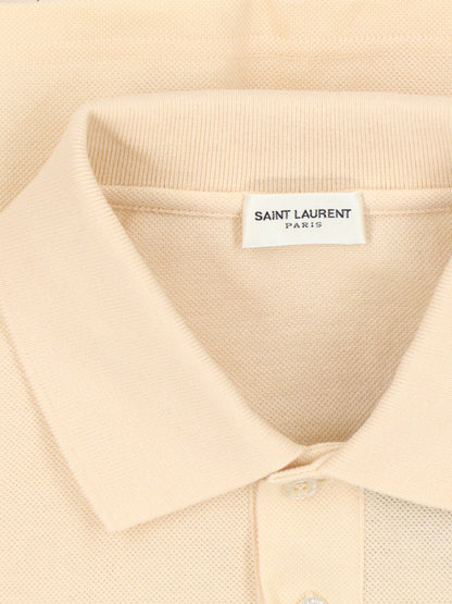 Saint Laurent Polo logo-Polo-Saint Laurent-Polo logo Saint Laurent, in misto cotone giallo, colletto classico, bottoni fronte, maniche corte, ricamo logo blu petto, orlo dritto.-Dresso