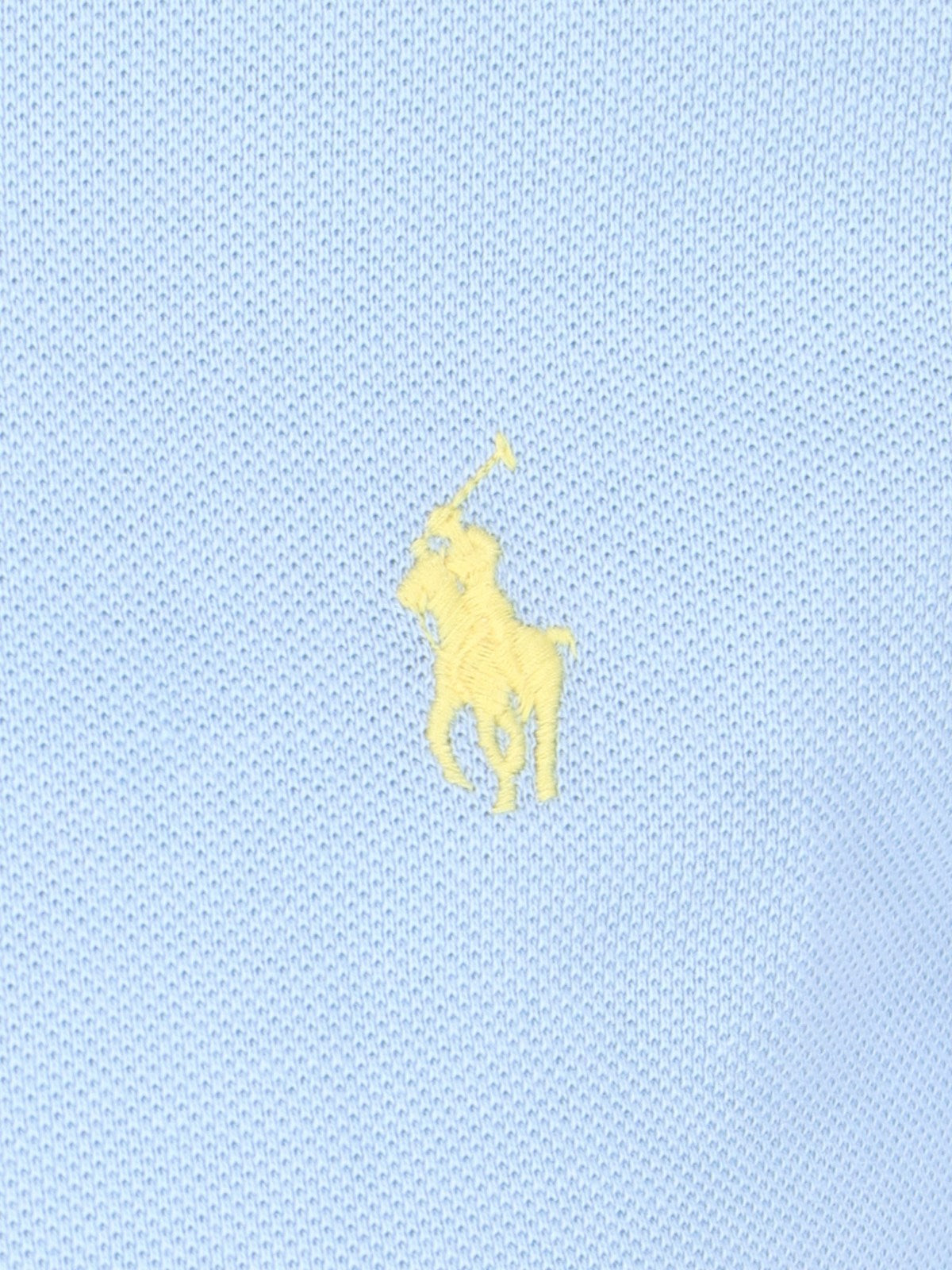 Polo Ralph Lauren polo logo-t-shirt-Polo Ralph Lauren-Polo logo Polo Ralph Lauren, in cotone azzurro, colletto classico, bottoni fronte, maniche corte, ricamo logo giallo petto, orlo dritto.-Dresso