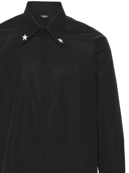 Camicia nera con dettagli metallici