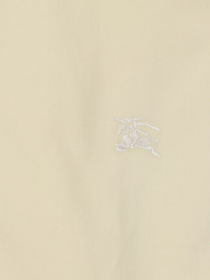 Burberry Camicia oxford-camicie-Burberry-Camicia oxford Burberry, in cotone beige, colletto button-down, maniche corte, chiusura bottoni, ricamo logo frontale tono su tono, orlo curvo-Dresso