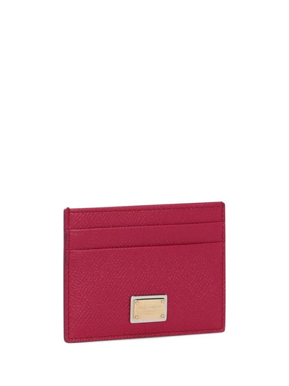 Card holder with logo plaque