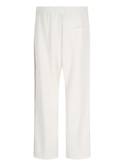 Side button trousers