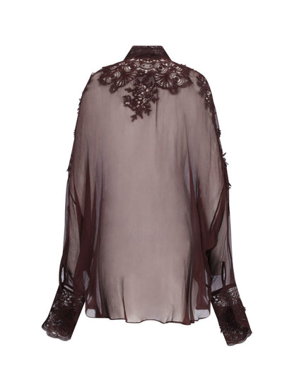 Blusa floreale trasparente