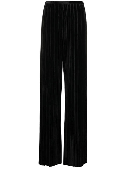 Trousers with flared hem