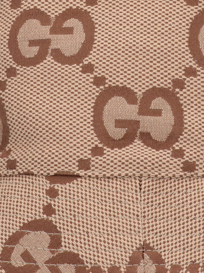 Gucci cappello bucket "jumbo GG"-cappelli-Gucci-Cappello bucket "jumbo GG" Gucci, in misto cotone marrone, pattern logo all-over, visiera ampia.-Dresso