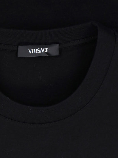 Versace T-Shirt "Milano stamp"-t-shirt maniche lunghe-Versace-T-shirt "Milano stamp" Versace, in cotone nero, girocollo, ricamo logo bianco fronte e retro, polsini a costine, orlo dritto.-Dresso