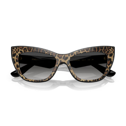 DG4417 31638G-Occhiali da sole-Dolce & Gabbana-Questo occhiale da sole Dolce & Gabbana ha uno stile d'ispirazione retrò. Sofisticata forma cat-eye ultra femminile con frontale a doppio strato ed eleganti opzioni di stampa. Forma multidimensionale cat eye in acetato con logo Dolce&Gabbana sulle aste. L'iconica stampa leopardo è abbinata all'acetato marrone e alle lenti sfumate nere. - Dresso