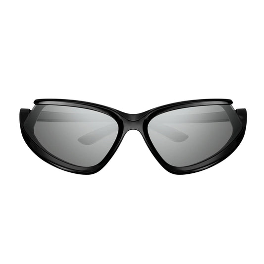 BB0289S 001-Occhiali da sole-Balenciaga-Balenciaga presenta la sua ultima collezione di occhiali da sole, caratterizzata da un'audace estetica contemporanea. Questa linea rappresenta una vera e propria dichiarazione di stile, perfetta per chi desidera un accessorio moderno e sofisticato. In particolare, il modello BB0289S è caratterizzato da una montatura interamente iniettata con uno stile sportivo-futuristico. La forma avvolgente si distingue per le lenti tagliate e spostate sui lati. Il nuovo design dei 